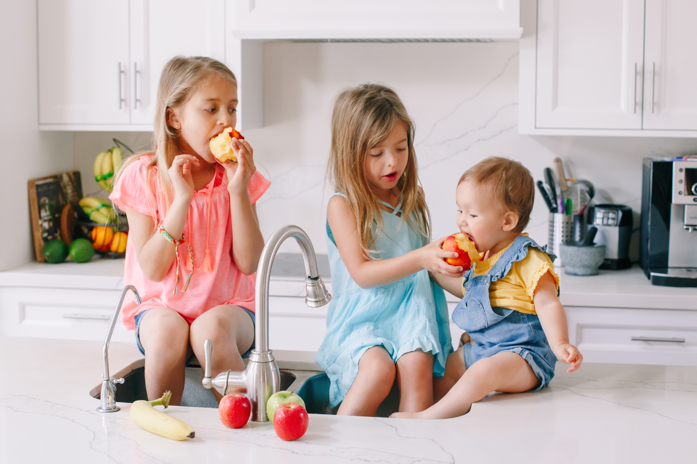 Kids Eating Fruits in the Kitchen