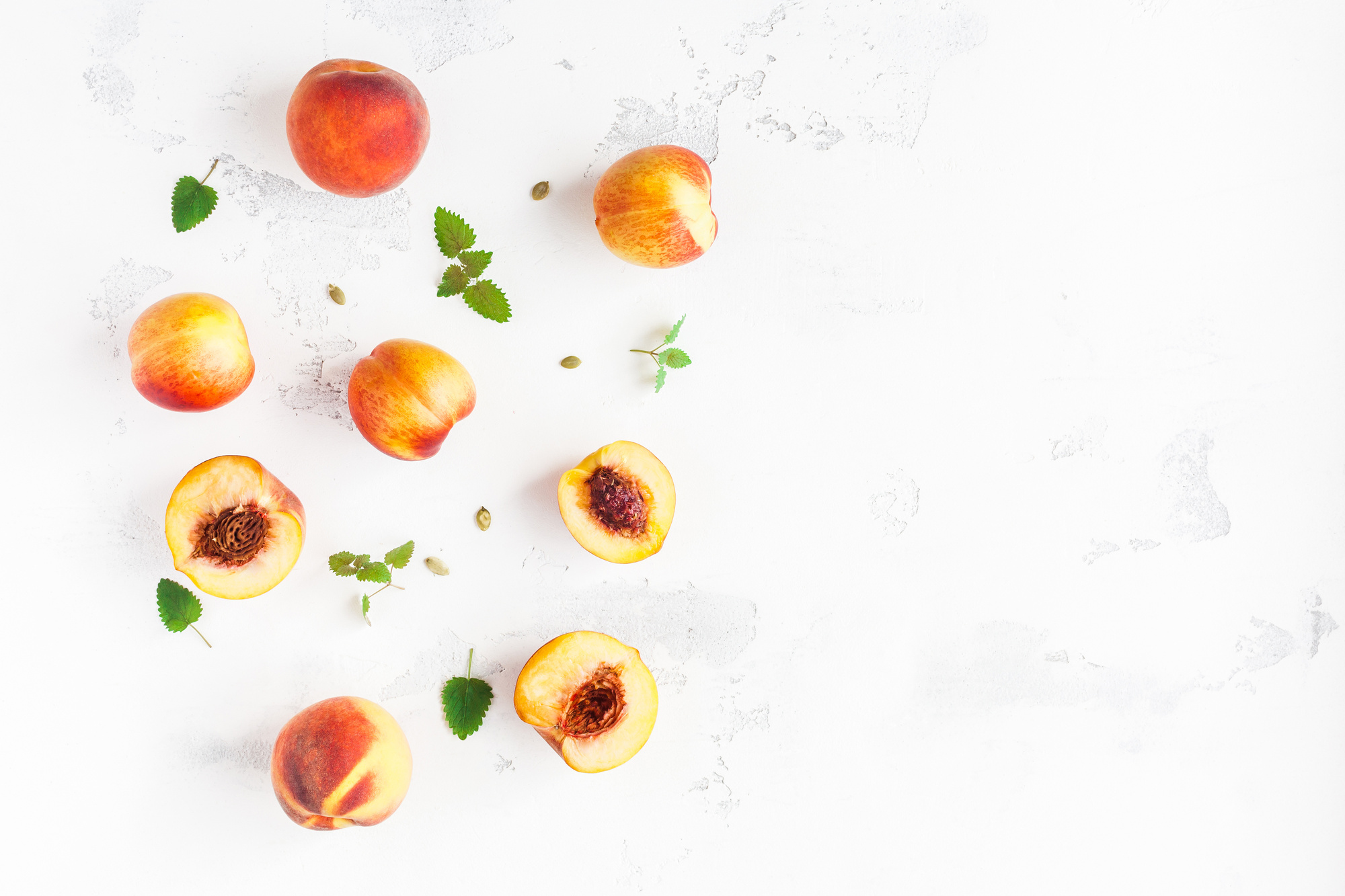 Fresh peaches on white background. Flat lay, top view